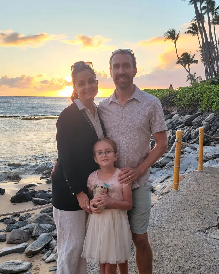 Mike Yeany and his family at sunset on the West Maui shoreline